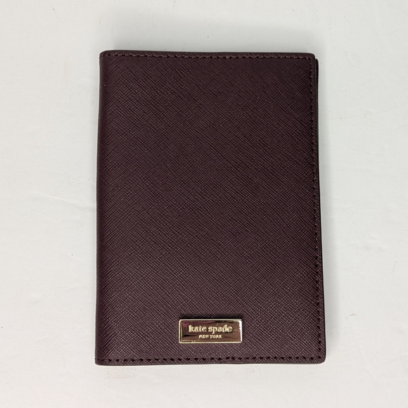 Kate Spade NY Laurel Way Saffiano Leather Passport Holder Cherrywood - Picture 1 of 7
